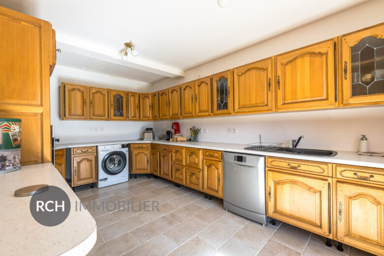 Photos du bien : Béhoust – Maison familiale sur joli terrain arboré entièrement clos
