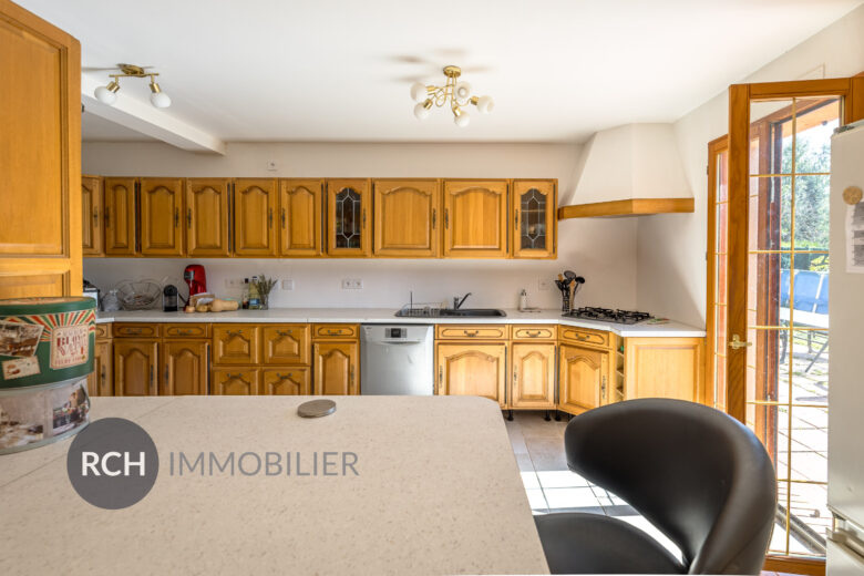 Photos du bien : Béhoust – Maison familiale sur joli terrain arboré entièrement clos
